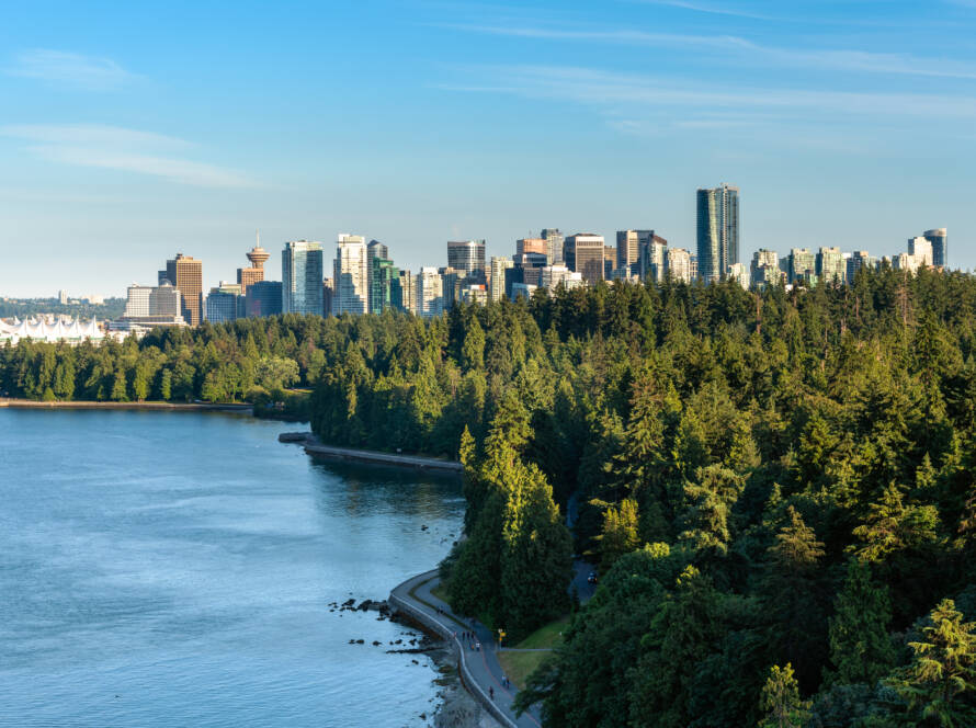 Vancouver skyline framed by forest and ocean, reflecting local death care rooted in place and community